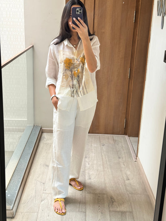 White printed flower shirt & White pants